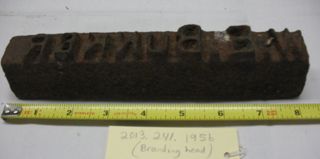 Head of a branding iron: W.E. BUNKER