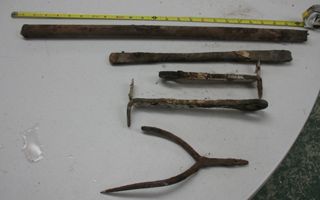 Five metal items from fireplace of GCCC parsonage house