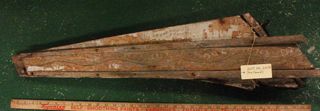 Trailboard from sloop; Stanley cemetery post; powder horn