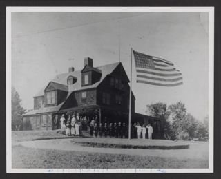 Group by Flag Outside Otter Cliffs Radio Station Photograph