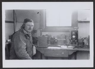 Otter Cliffs Radio Station Worker "Folker" at Controls Print