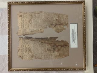 Remnants of 1886 newspaper discovered in parsonage house floor boards