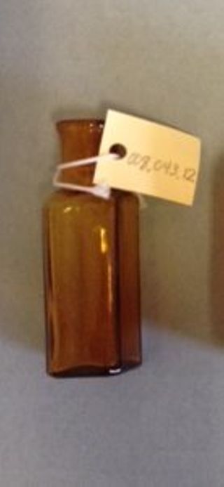 Small Amber.Colored Square Glass Bottle