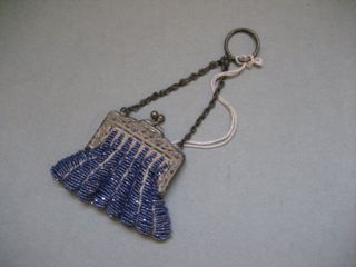 Small beaded purse with chain and ring