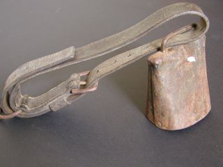 Cow bell with leather strap