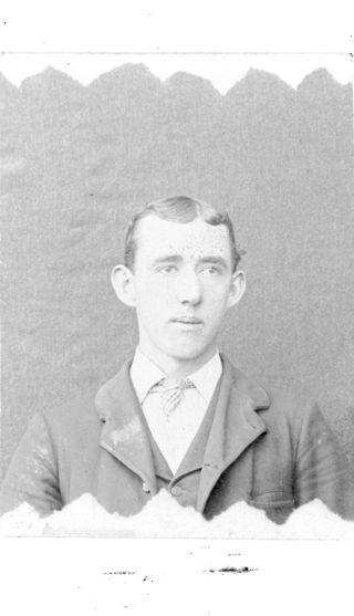 Formal photo of young man in suit