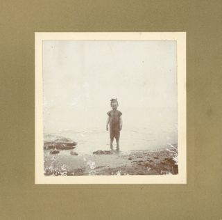 Unknown girl by lake