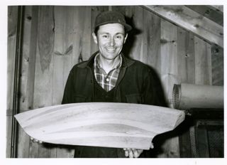 Ralph Stanley holding half model