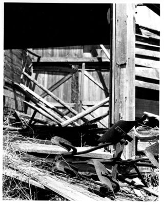 Rusting farm equipment by LaRue Spiker