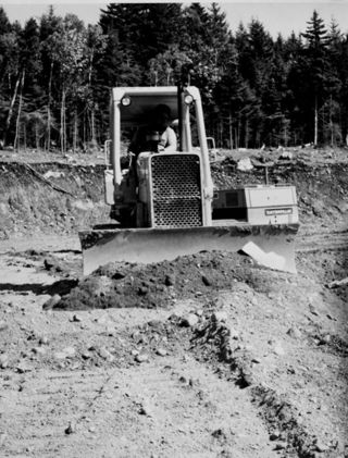 Unknown man in bull dozer