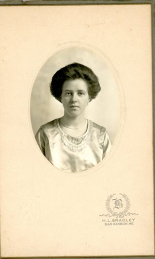 Young woman with silky white dress