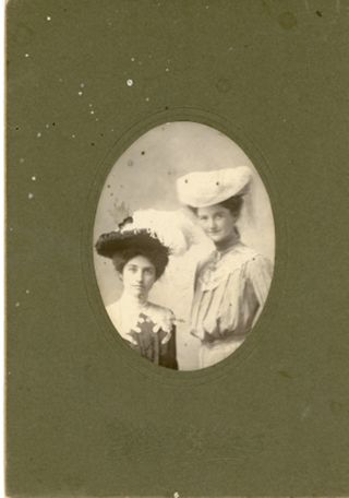 Portrait of two young women in large hats