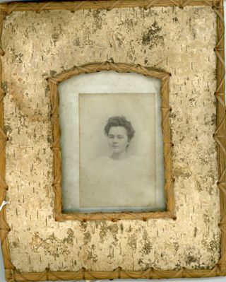 Portrait of young girl in white fuffly dress