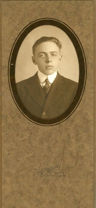 Young man in dark suit and tie