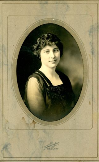 Young woman with short curly hair