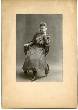 woman seated on chair