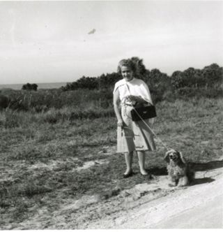 Louise Gilbert walking a dog