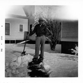 Man with Snow Shovel