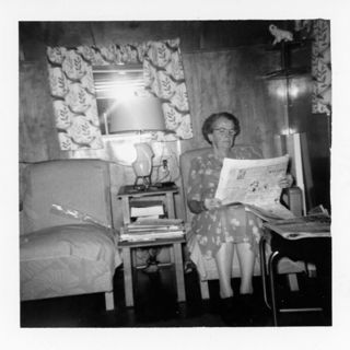 Woman with Newspaper