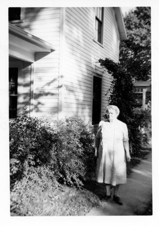 Woman near a House