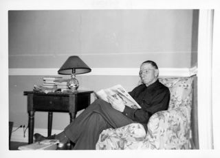Man Reading Newspaper