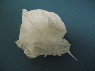Infant's embroidered and lace bonnet