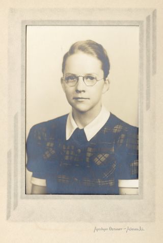 LaRue Spiker as a young lady with hexagonal glasses
