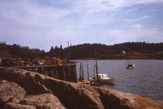 Lobster Boat Next to Pier.
