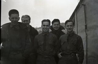 CCC camp, Men and camp buildings, c. 1930