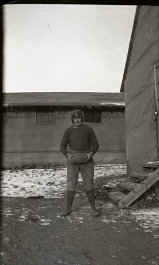 CCC camp, Men and camp buildings, c. 1930