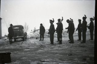 CCC camp, Men and camp buildings, c. 1930