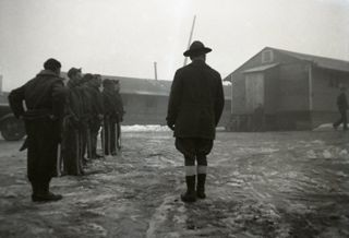 CCC camp, Men and camp buildings, c. 1930