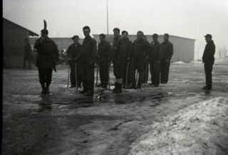 CCC camp, Men and camp buildings, c. 1930