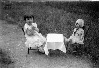 Barbara Somes with her doll