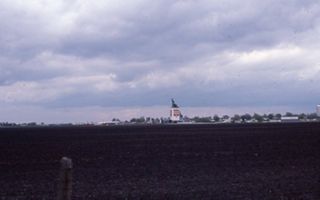Buildings along field.