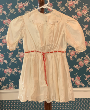 Child's dress trimmed with lace