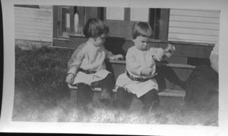 two young toddlers, possibly twins