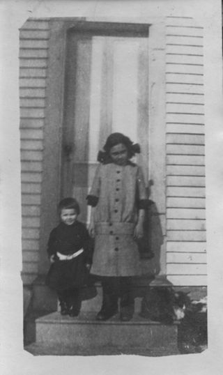 Trask, Millicent, and Gardner Reed, children posing outside