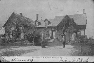 Maurice R. & Almira Rich, older, outside their home