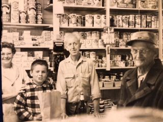 Dana Reed, boy, at the H.G. Reed store