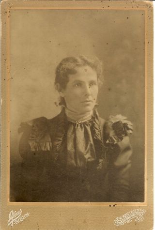 Nellie M. Clark, young woman