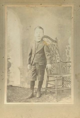 George E. Rumill, boy, formal photo