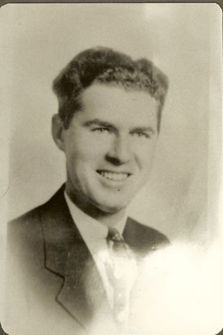 Albert Gott in suit & tie, professional photo