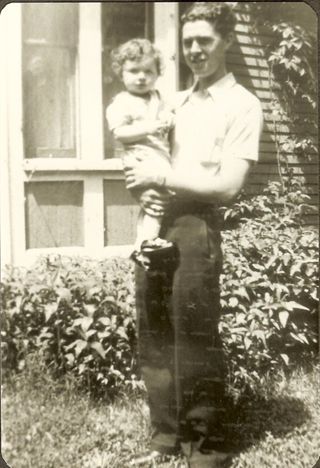 Albert Gott holding baby Norman