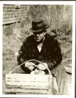 Raymond Griffin Sr., shelling clams
