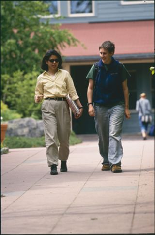 Bonnie Tai walking with Piper Dumont '02