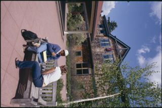 Unknown people outside Kaelber Hall