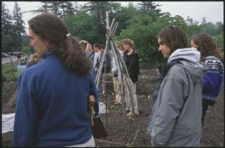 <span data-sheets-root="1">Suzanne Morse with class in the Community Garden</span>